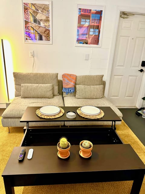 The coffee table lifts up for eating, working, or extra space. 