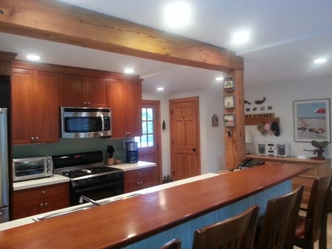 GOURMET KITCHEN WITH LARGE DINING BAR