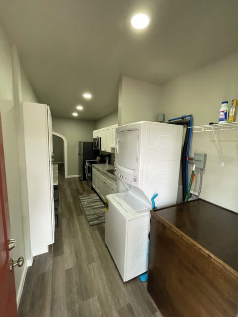 Private utility area with washer and dryer