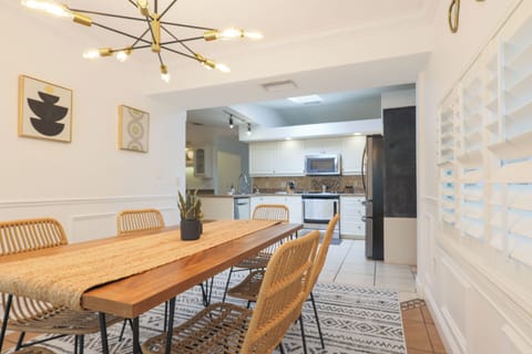 The dining area is conveniently just steps away from the kitchen