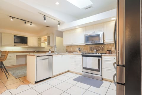 Cook with ease in our tiled kitchen area