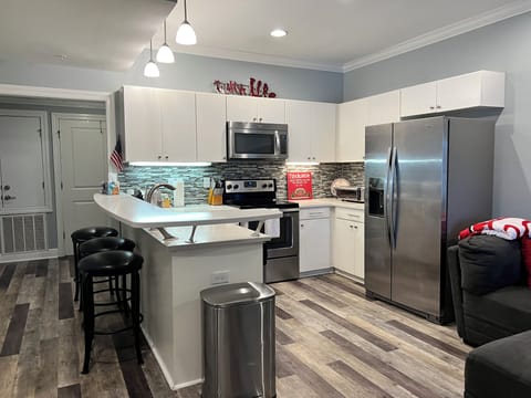 Kitchen with bar seating for 3