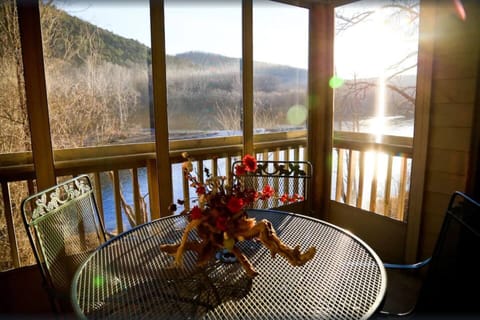 Screened in porch overlooking Lake Taneycomo