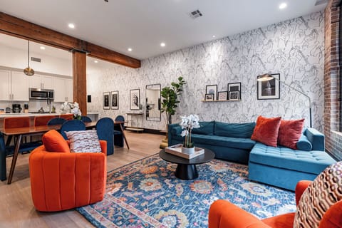 Relax in the living area with a smart TV, stylish seating and a sleeper sofa for extra guests. Perfect for families or group stays in New Orleans, this inviting space is ideal for movie nights or recharging after a day in the city.