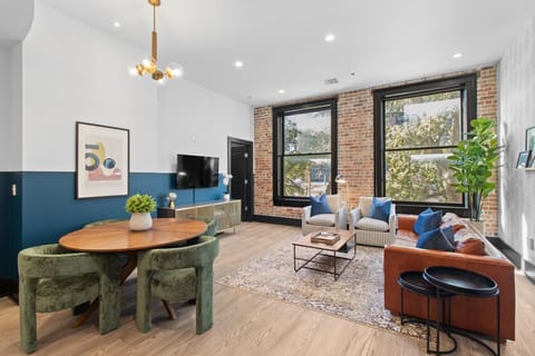 Relax in the living area with a smart TV, stylish seating and a sleeper sofa for extra guests. Perfect for families or group stays in New Orleans, this inviting space is ideal for movie nights or recharging after a day in the city.