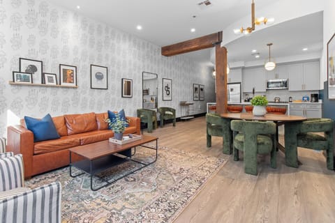 Relax in the living area with a smart TV, stylish seating and a sleeper sofa for extra guests. Perfect for families or group stays in New Orleans, this inviting space is ideal for movie nights or recharging after a day in the city.