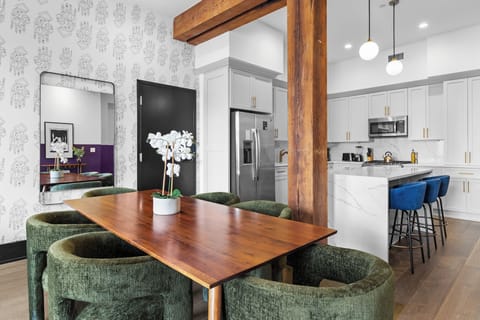 Relax in the living area with a smart TV, stylish seating, and a sleeper sofa for extra guests. Perfect for families or group stays in New Orleans, this inviting space is ideal for movie nights or recharging after a day in the city.