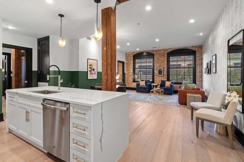 Cook or snack in style with a full kitchen featuring GE stainless appliances, cookware, and an island with bar seating. Ideal for short or extended stays, our kitchens make group travel in New Orleans easy and comfortable.