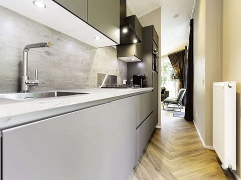 Property, Cabinetry, Sink, Tap, Building, Interior Design, Plumbing Fixture, Countertop, Kitchen, Floor