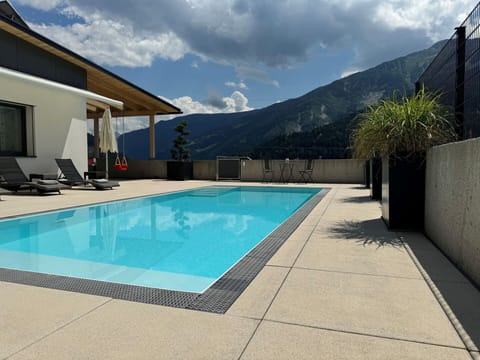 Water, Sky, Cloud, Daytime, Property, Swimming Pool, Building, Azure, Shade, Rectangle
