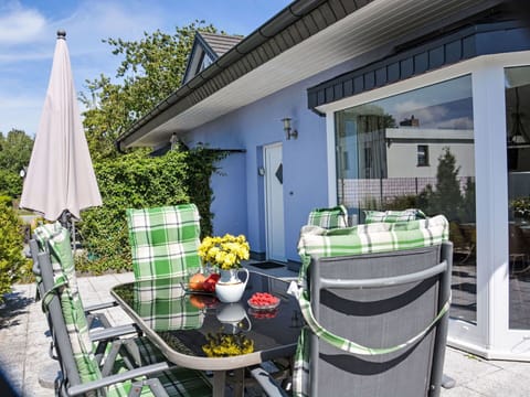 Building, Plant, Sky, Flowerpot, Window, Cloud, Shade, Interior Design, House, Table
