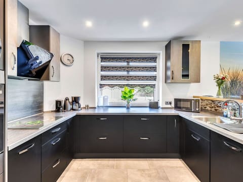 Kitchen, Interior Design, Furniture, Countertop, Cabinetry, Kitchen Appliance, Home, Major Appliance, Flooring, Lighting