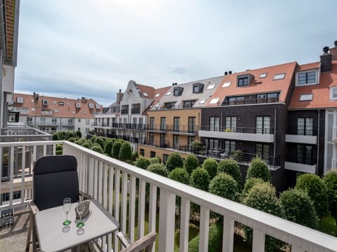 Cloud, Sky, Building, Property, Window, Furniture, Plant, Chair, Urban Design, House
