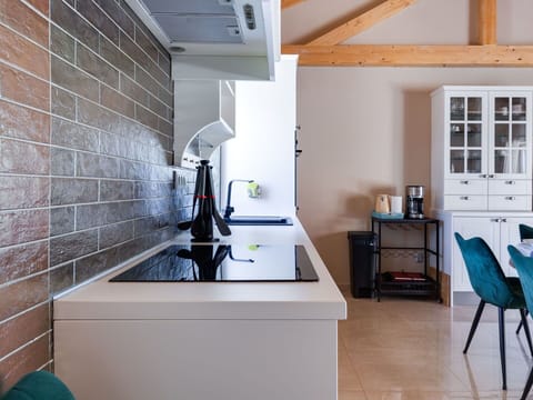 Furniture, Kitchen, Countertop, Kitchen Appliance, Cabinetry, Interior Design, Flooring, Wall, Major Appliance, Wood