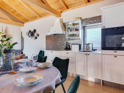 Furniture, Interior Design, Kitchen, Flooring, Countertop, Ceiling, Wood, Light Fixture, Lighting, Floor