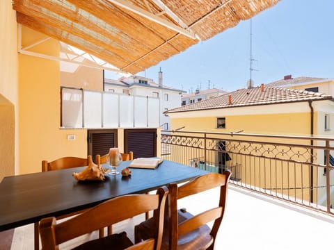Sky, Property, Furniture, Table, Azure, Chair, Building, Window, Shade, Architecture