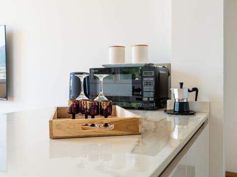 Sky, Property, Furniture, Table, Azure, Chair, Building, Window, Shade, Architecture