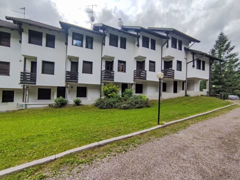 Sky, Property, Furniture, Table, Azure, Chair, Building, Window, Shade, Architecture