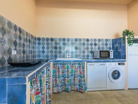 Blue, Major Appliance, Flooring, Washing Machine, Kitchen, Interior Design, Floor, Kitchen Appliance, Tile, Laundry Room