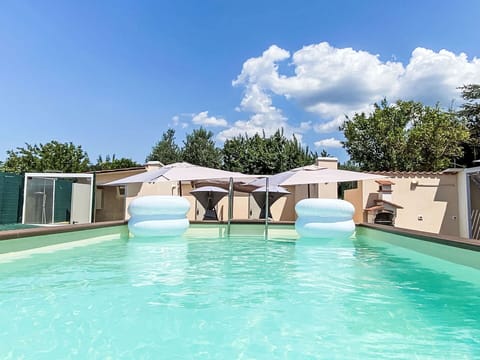 Sky, Property, Furniture, Table, Azure, Chair, Building, Window, Shade, Architecture