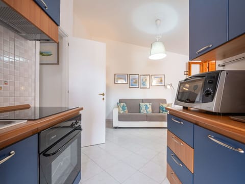 Cabinetry, Furniture, Building, Wood, Lighting, Kitchen, Interior Design, Countertop, Drawer, Flooring