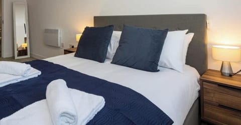 Drift off in style with plush navy bedding and a calming colour palette designed for a great sleep