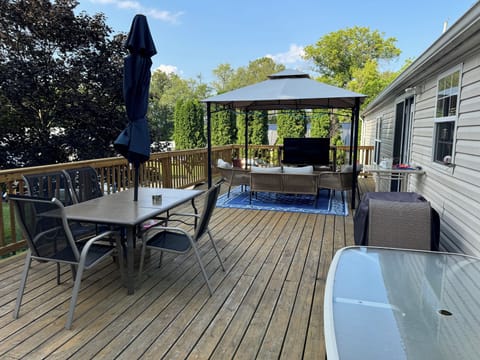 Large outdoor deck overlooking 1 acre of land and neighboring farm!