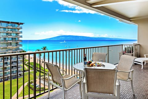 Private lanai dining with breathtaking ocean views, offering a front-row seat to Ka'anapali's stunning coastline and vibrant blue waters.