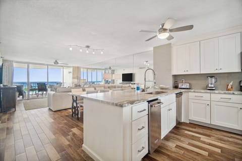 Remodeled Kitchen with granite countertops, stainless appliances - cook delicious meals and dine while overlooking the Gulf of Mexico!