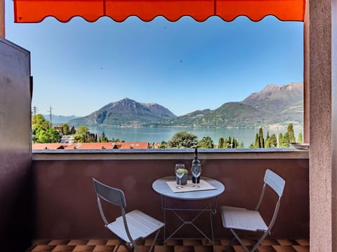 Sky, Furniture, Property, Table, Building, Mountain, Window, Azure, Shade, Lighting