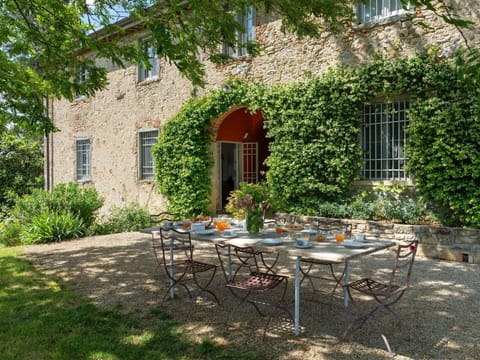 Plant, Building, Table, Window, Property, Furniture, Nature, Outdoor Table, Chair, Shade