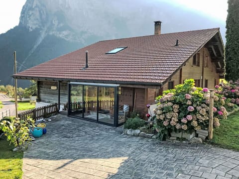 Plant, Property, Mountain, Window, Flower, Building, Sky, Natural Landscape, Cottage, House
