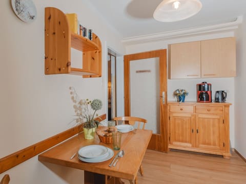 Cabinetry, Property, Furniture, Wood, Chair, Interior Design, Lighting, Table, Countertop, Flooring