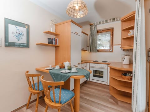 Table, Furniture, Property, Chair, Azure, Cabinetry, Wood, Interior Design, Floor, Flooring