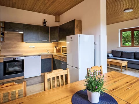 Furniture, Property, Cabinetry, Countertop, Plant, Couch, Table, Wood, Interior Design, Kitchen Appliance