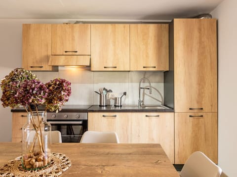 Brown, Cabinetry, Countertop, Property, Furniture, Flower, Kitchen Sink, Sink, Wood, Kitchen