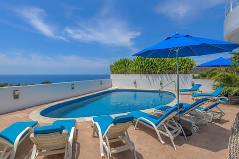 Admire the sunset from your pool