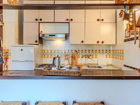 Product, Cabinetry, Kitchen, Orange, Interior Design, Countertop, Rectangle, Wood, Line, Wall