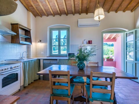 Table, Furniture, Property, Blue, Wood, Window, Cabinetry, Interior Design, Lighting, Houseplant