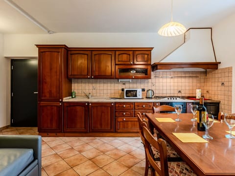 Interior Design, Wood, Flooring, Furniture, Ceiling, Kitchen, Floor, Countertop, Room, Cabinetry