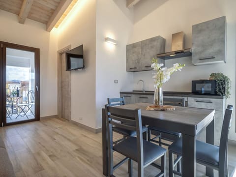 Table, Furniture, Property, Countertop, Cabinetry, Wood, Lighting, Interior Design, Building, Floor