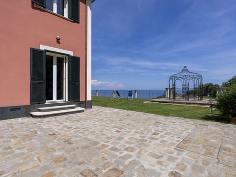 Sky, Plant, Property, Cloud, Building, Window, Road Surface, Architecture, Door, Urban Design