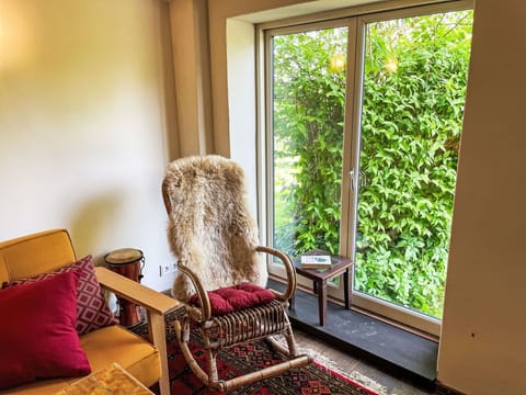 Wood, Comfort, Textile, Building, Window, Interior Design, Floor, Chair, Flooring, Plant