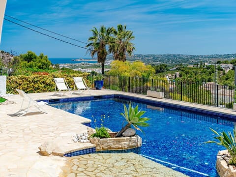 Sky, Table, Property, Furniture, Building, Plant, Chair, Window, Outdoor Table, Tableware