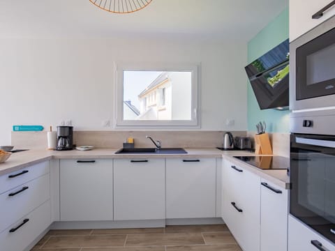 Kitchen, Countertop, Kitchen Appliance, Cabinetry, Interior Design, Furniture, Major Appliance, Flooring, Home Appliance, Wood