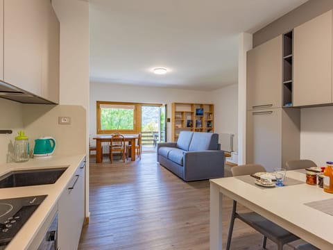 Furniture, Property, Table, Cabinetry, Wood, Shelving, Interior Design, Flooring, Shelf, Couch