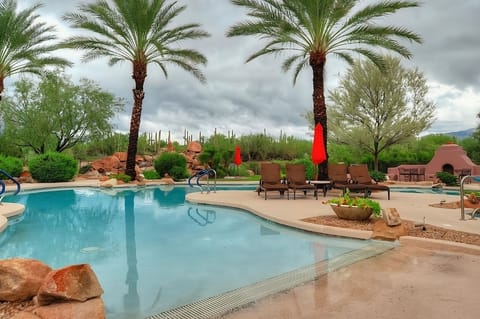 Cool off with an easy pool entry and shaded loungers.