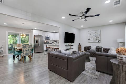 Bright, airy open-concept livingroom, designed for connecting w/family & friends