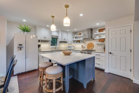 Stocked kitchen with island seating for all those extra hands in the kitchen.