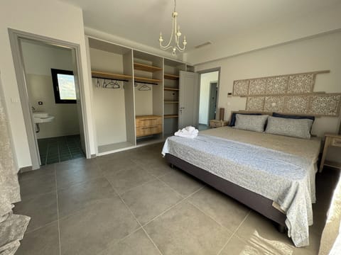 master bedroom extra long bedf and in room bathroom